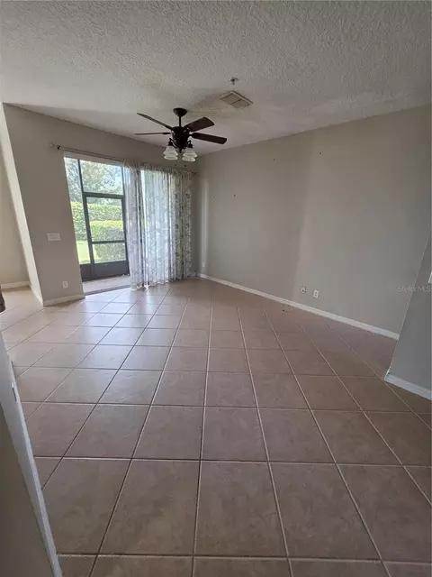 Living - 708 Fortanini Cir, Ocoee, FL 34761 photo 1 of 1