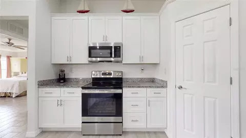 Kitchen - 4820 Mackerel Dr, Sebring, FL 33870 photo 3 of 4
