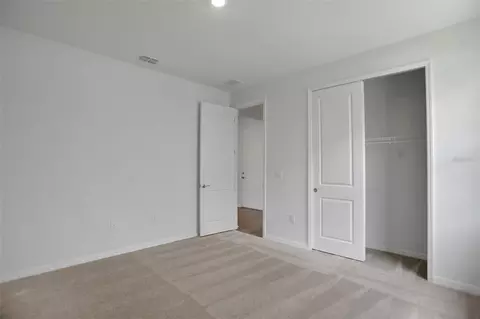 Bedroom - 7418 Sea Manatee St, Parrish, FL 34219 photo 10 of 12