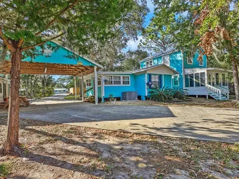 Exterior - 112 8th St NE, Steinhatchee, FL 32359 photo 2 of 12