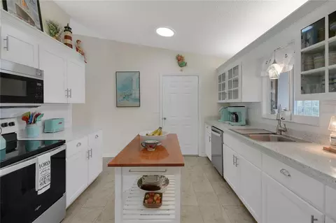 Kitchen - 10608 SE 174th Loop, Summerfield, FL 34491 photo 3 of 7