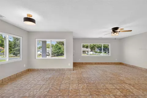 Living - 1012 N Baker St, Mount Dora, FL 32757 photo 10 of 16