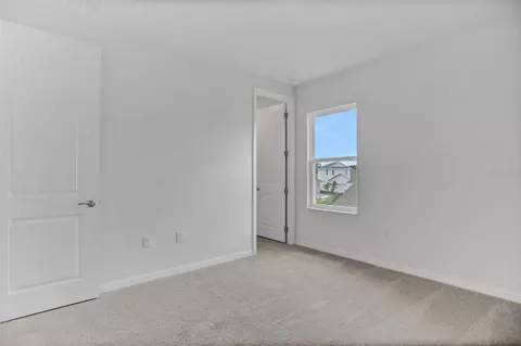 Bedroom - 7422 Sea Manatee St, Parrish, FL 34219 photo 9 of 15