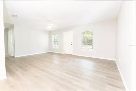 Living - 306 E Georgia Ave, Bushnell, FL 33513 photo 2 of 3