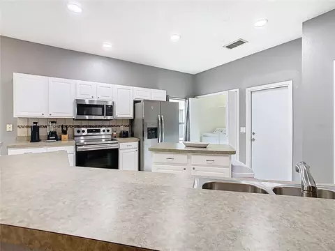 Kitchen - 114 Sandy Point Way, Clermont, FL 34714 photo 2 of 9