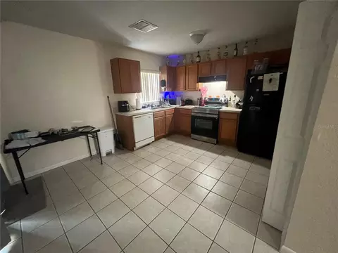 Kitchen - 1120 S Mary St, Eustis, FL 32726 photo 3 of 4