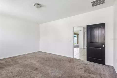 Bedroom - 5277 SE 91st Pl, Ocala, FL 34480 photo 2 of 8