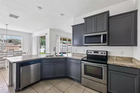 Kitchen - 5277 SE 91st Pl, Ocala, FL 34480 photo 3 of 4