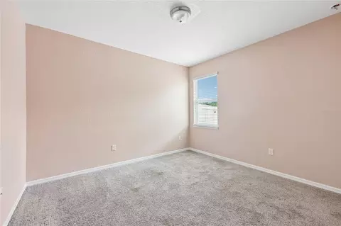Bedroom - 5277 SE 91st Pl, Ocala, FL 34480 photo 3 of 8