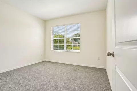 Bedroom - 134 Hickory Course Trl, Ocala, FL 34472 photo 5 of 8