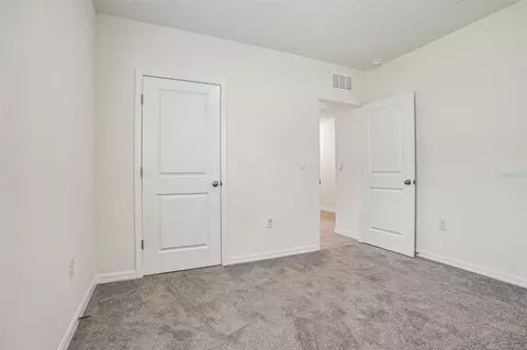 Bedroom - 134 Hickory Course Trl, Ocala, FL 34472 photo 8 of 8