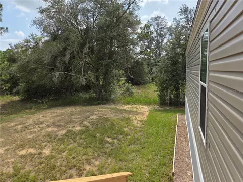 Exterior - 9448 Rousseau St, Webster, FL 33597 photo 6 of 10