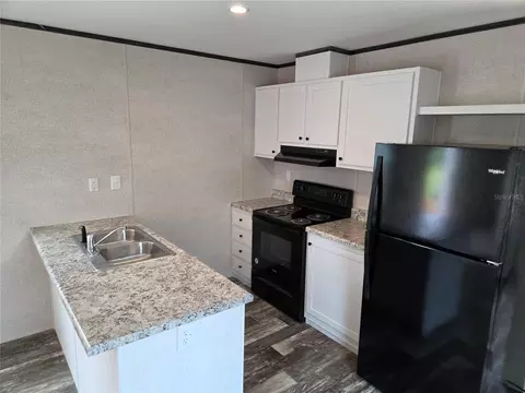 Kitchen - 9448 Rousseau St, Webster, FL 33597 photo 2 of 3
