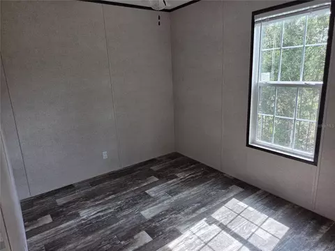Bedroom - 9448 Rousseau St, Webster, FL 33597 photo 2 of 3