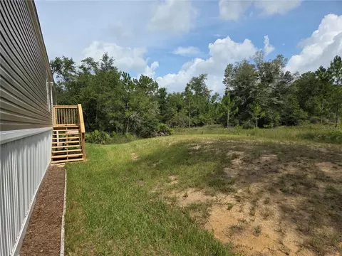 Exterior - 9448 Rousseau St, Webster, FL 33597 photo 9 of 10