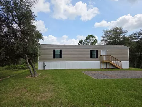 Exterior - 9448 Rousseau St, Webster, FL 33597 photo 3 of 10