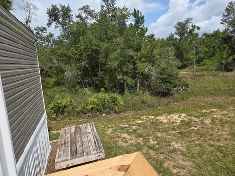 Exterior - 9448 Rousseau St, Webster, FL 33597 photo 7 of 10