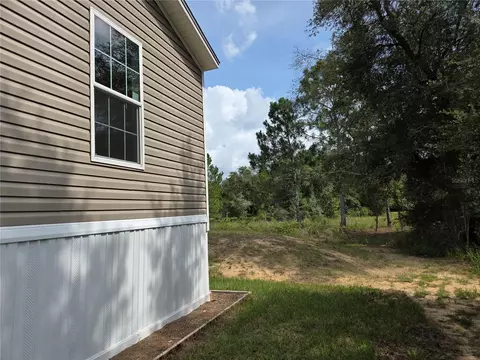 Exterior - 9448 Rousseau St, Webster, FL 33597 photo 8 of 10