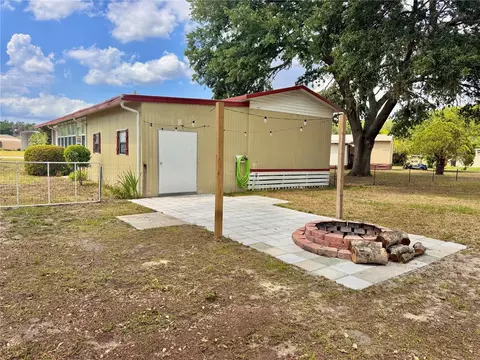 Exterior - 10113 SE 24th Dr, Webster, FL 33597 photo 5 of 12