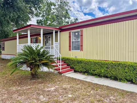 Exterior - 10113 SE 24th Dr, Webster, FL 33597 photo 3 of 12