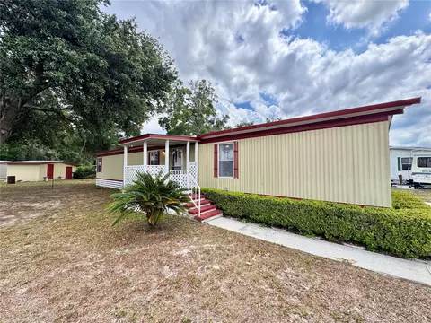 Exterior - 10113 SE 24th Dr, Webster, FL 33597 photo 2 of 12