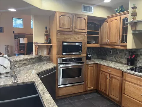Kitchen - 5361 Circle Dr, Weeki Wachee, FL 34607 photo 4 of 4