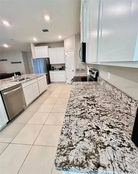 Kitchen - 6853 SE 3rd Loop, Ocala, FL 34472 photo 2 of 4