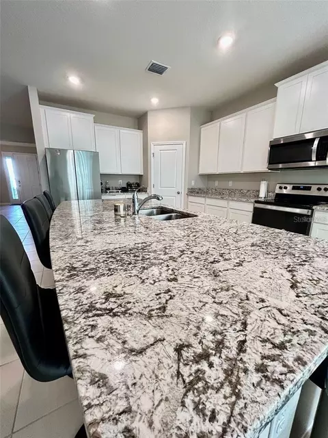 Kitchen - 6853 SE 3rd Loop, Ocala, FL 34472 photo 3 of 4
