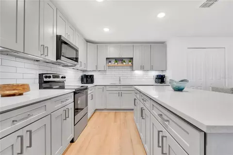 Kitchen - 233 E 16th St, Apopka, FL 32703 photo 2 of 2