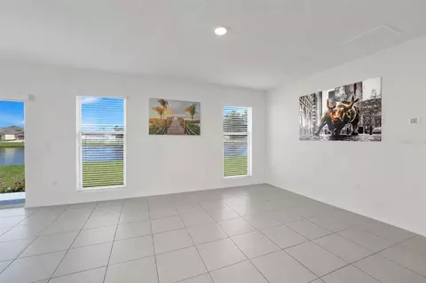 Living - 330 Briar Patch Loop, Davenport, FL 33896 photo 2 of 2