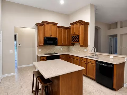 Kitchen - 105 E Blue Water Edge Dr, Eustis, FL 32736 photo 2 of 3