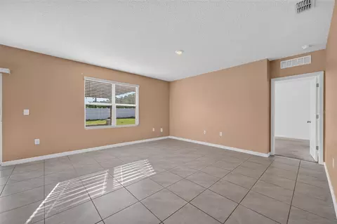 Living - 3042 Bethpage Loop, Mount Dora, FL 32757 photo 2 of 7