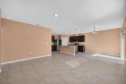 Living - 3042 Bethpage Loop, Mount Dora, FL 32757 photo 4 of 7