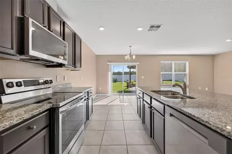 Kitchen - 3042 Bethpage Loop, Mount Dora, FL 32757 photo 7 of 8