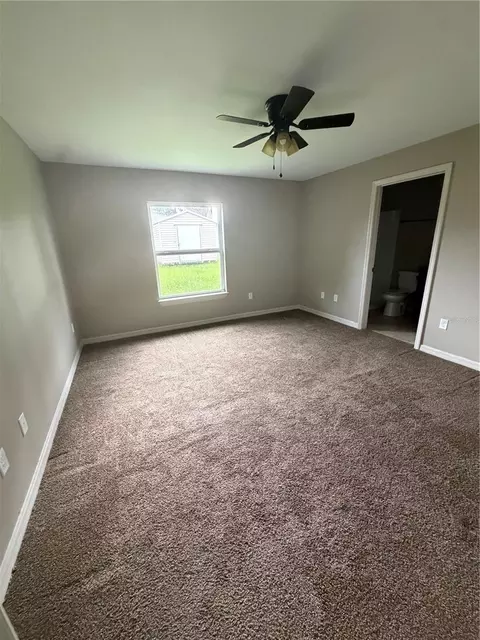Bedroom - 5713 SW 128th Pl, Ocala, FL 34473 photo 3 of 3