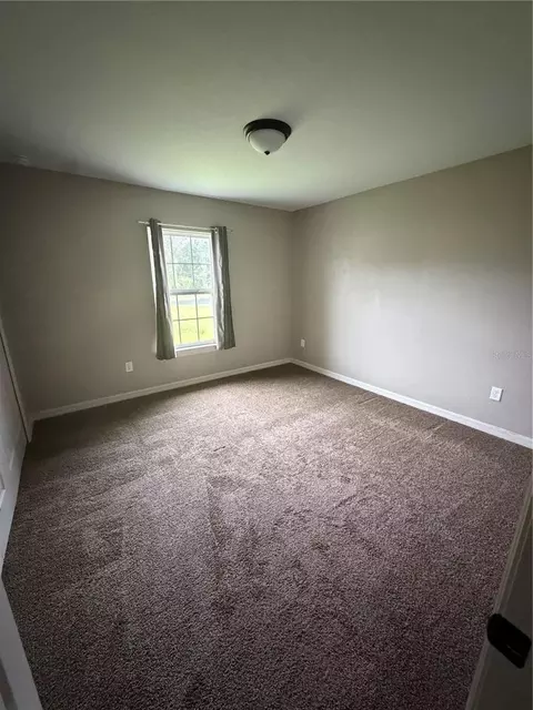 Bedroom - 5713 SW 128th Pl, Ocala, FL 34473 photo 1 of 3