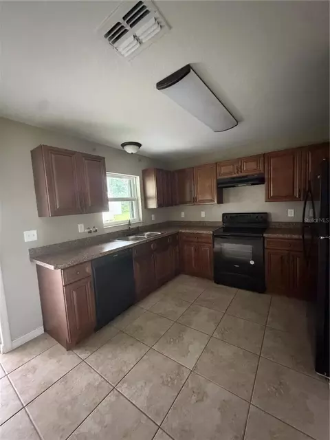 Kitchen - 5713 SW 128th Pl, Ocala, FL 34473 photo 2 of 3