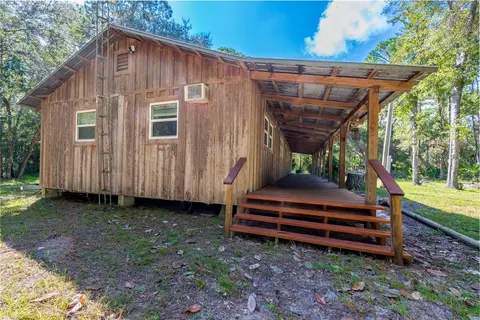 Exterior - 6550 SW 100th Ct, Cedar Key, FL 32625 photo 9 of 13