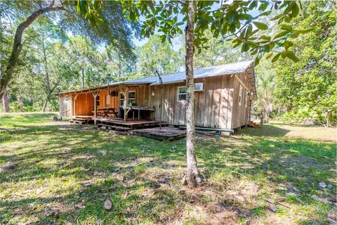 Exterior - 6550 SW 100th Ct, Cedar Key, FL 32625 photo 7 of 13