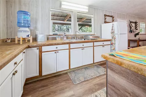 Kitchen - 6550 SW 100th Ct, Cedar Key, FL 32625 photo 2 of 4