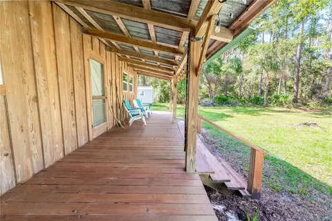 Exterior - 6550 SW 100th Ct, Cedar Key, FL 32625 photo 4 of 13