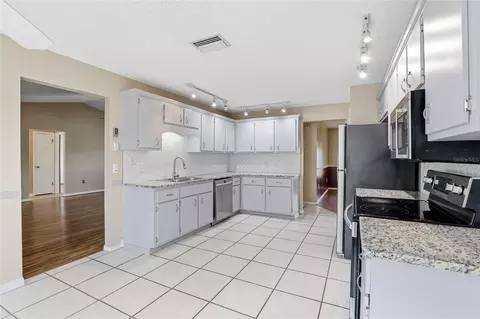 Kitchen - 3940 SW 134th St, Ocala, FL 34473 photo 2 of 4