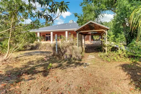 Exterior - 1000 Rabbit Run Rd, Naples, FL 34120 photo 3 of 10