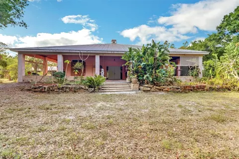 Exterior - 1000 Rabbit Run Rd, Naples, FL 34120 photo 2 of 10