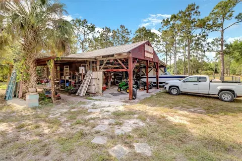 Exterior - 1000 Rabbit Run Rd, Naples, FL 34120 photo 4 of 10