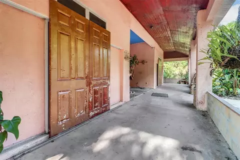 Exterior - 1000 Rabbit Run Rd, Naples, FL 34120 photo 6 of 10