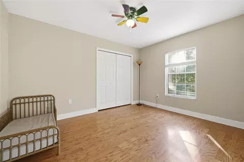 Bedroom - 10320 SW 17th Pl, Gainesville, FL 32607 photo 6 of 7