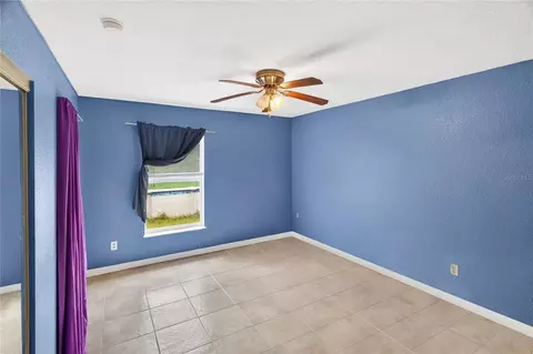 Bedroom - 5143 SW 155th Loop, Ocala, FL 34473 photo 2 of 8