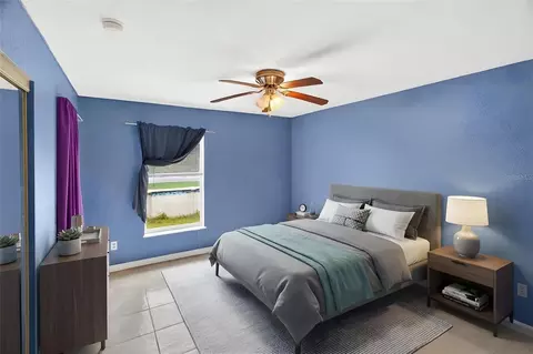 Bedroom - 5143 SW 155th Loop, Ocala, FL 34473 photo 4 of 8