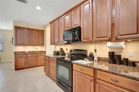 Kitchen - 5407 74th Pl E, Ellenton, FL 34222 photo 2 of 7